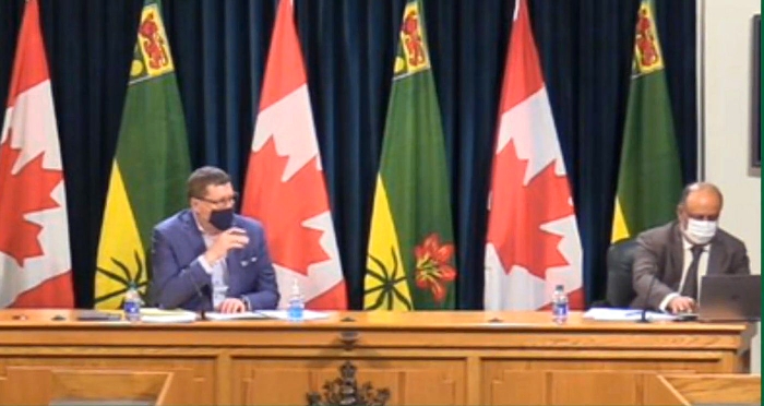 Premier Scott Moe, left, and Chief Medical Officer Dr. Saqib Shahab spoke repeatedly about how delaying a second vaccination dose can mean most of Saskatchewan could be vaccinated by June.